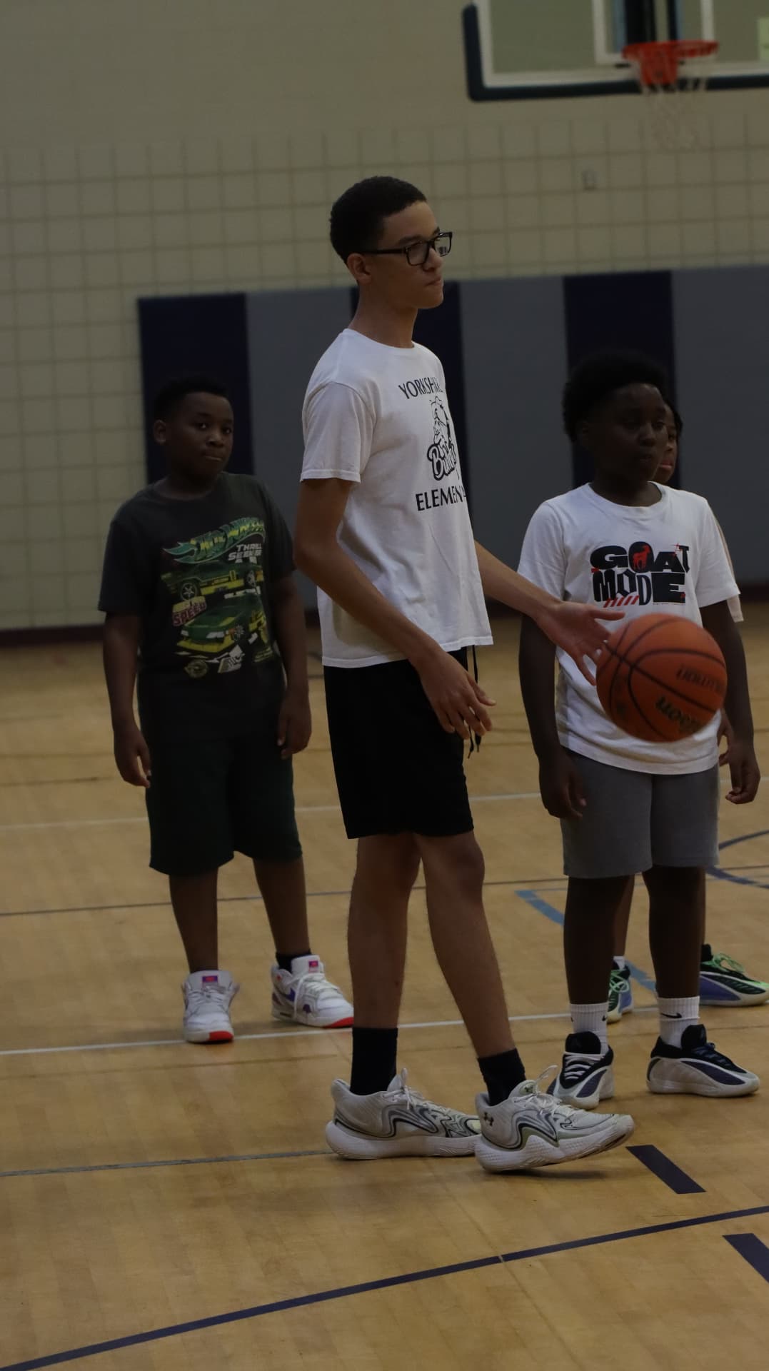 Advanced Fundamentals athletes in a group dribbling drill