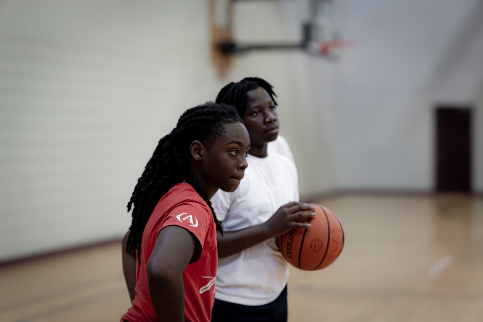 TAONI Basketball athletes locked in during a training session